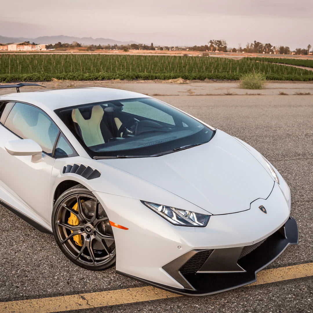 LAMBORGHINI HURACAN NOVARA EDIZIONE AERO FRONT FENDERS W/INTEGRATED VENTS AND SPLASH SHIELDS (2X2 GLOSS CARBON) - [The Exotic Hub]
